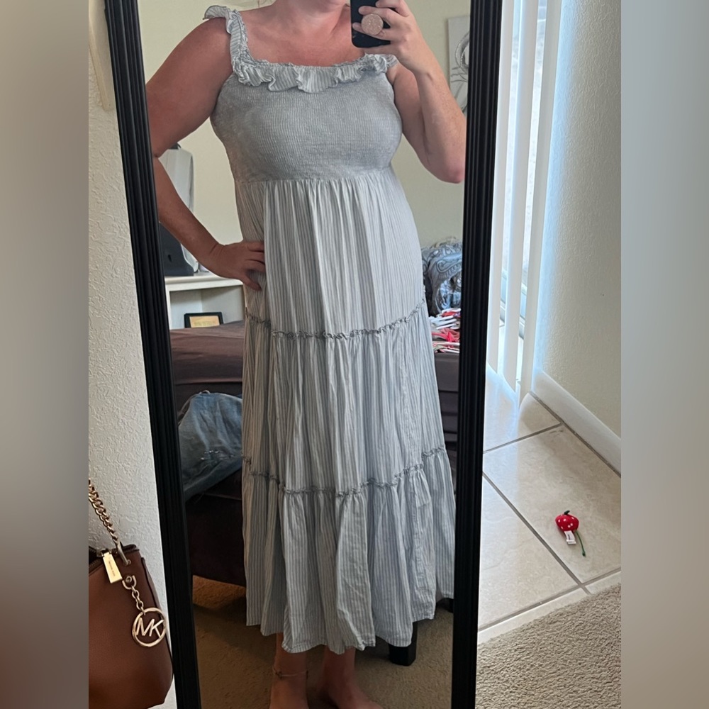 White and denim blue stripped dress with flowy top detail. Size LARGE. Worn once